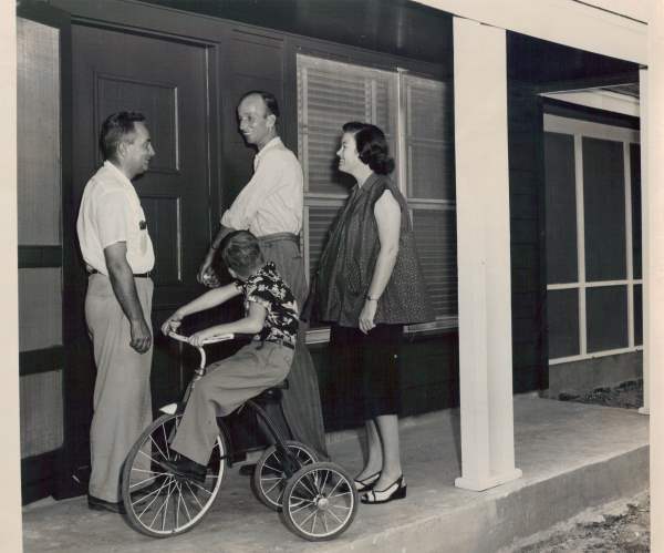 Dick Fritz shows Martin & Beverly Hills (with son Don) their new home in Westwood, Rocdkale, TX