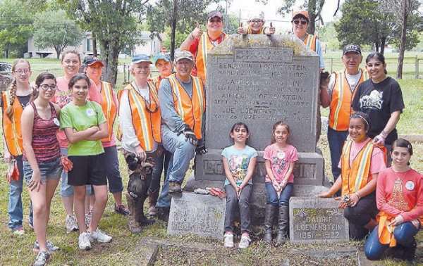 Girl Scout Troop 9603 & 9605 clean Old City Cemetery