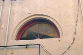 Arched windows in downtown Rockdale, TX