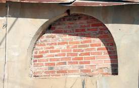 Arched windows in downtown Rockdale, TX