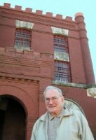 William C. Black in front of old Milam County, TX  jail